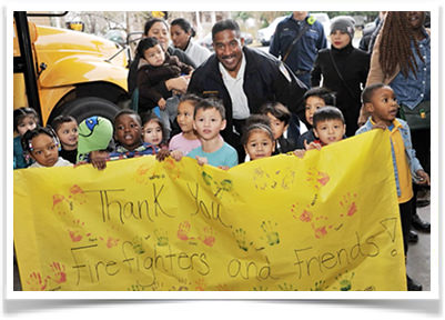 Children thanking Firefighters and Friends to the rescue.